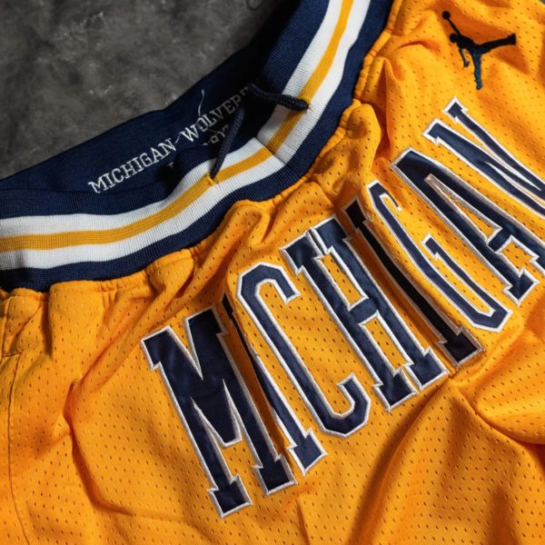 University of Michigan Shorts Gold logo